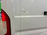 a white van with a sticker on the back of it