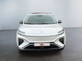 the front view of a white suv parked in a room