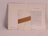 a book with a piece of paper on top of it