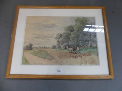 aquarelle encadrée représentant une route de campagne avec des vaches au loin