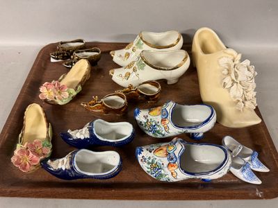 a tray that has many different types of shoes on it