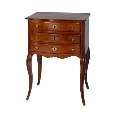 a small wooden chest of drawers with three drawers on each side