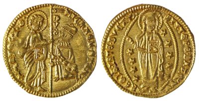 une pièce d'or sur laquelle sont représentés une femme et un homme