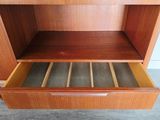an image of a wooden cabinet with a drawer