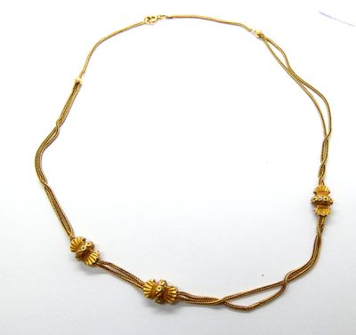 Collier en or jaune 750 °/°° (18k) à double chaîne, orné de … - Photo 1