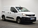 the white van is parked in a white room with a checkered floor
