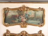 a picture of a painting on the wall above a mirror