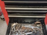 a tool box with tools in it in a garage
