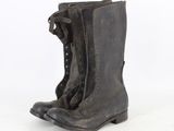 an image of a pair of black boots on a white background
