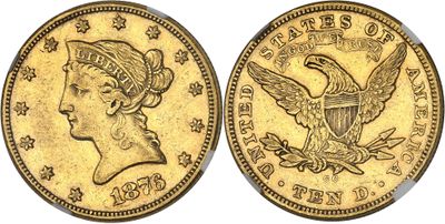a gold coin with an eagle on the front and a woman ' s head on the back