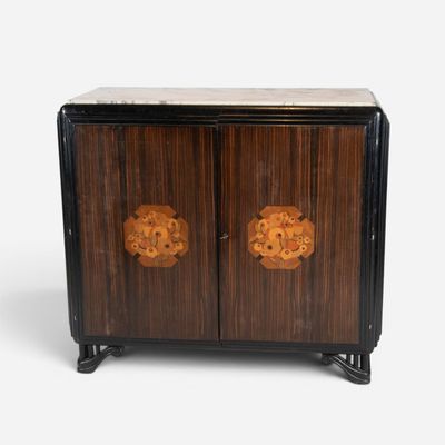 an image of a cabinet with two doors and a lion head on the front
