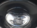 a close up view of a glass with water in it