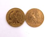 deux pièces d'or, dont l'une représente un coq et l'autre un coq