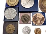 a lot of coins that are sitting on a table