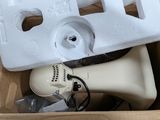 a box with a wii controller and a wii controller in it