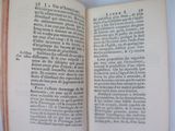 an open book with a picture of a man on it
