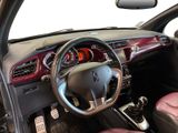 the interior of a car with red leather seats and a steering wheel