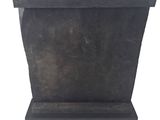 an image of a black planter sitting on top of a white surface