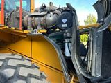 a picture of a close up of the front end of a bulldozer