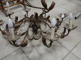 a chandelier that is sitting on the floor in the room