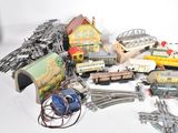 a lot of toy train tracks and trains on the table