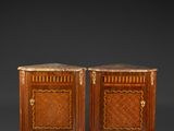 pair of bedside tables in the style of person