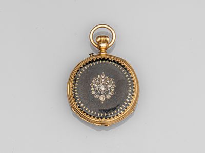 une montre de poche en or sertie de diamants