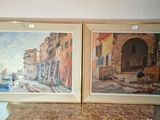 two paintings hanging on the wall next to each other