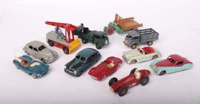 a lot of toy cars that are sitting on a table