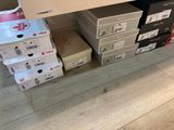 many boxes of food on the floor next to each other