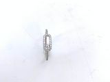 an image of a diamond ring sitting on top of a snow covered ground
