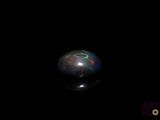 an image of a black sphere in the dark