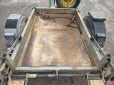 a trailer with a chain attached to the back of it
