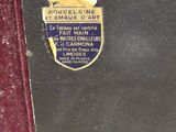 a close up of a piece of metal with a badge on it