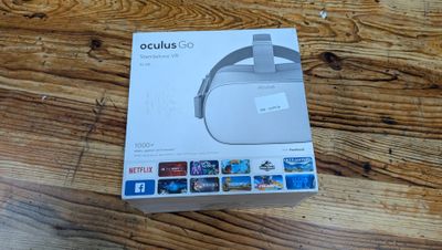 boxed box of the new oculuss go headphones on a wooden table
