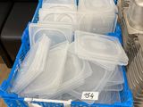 many containers of food sitting on a table in a store