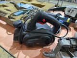 a picture of a corded sander on a table