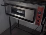 an image of a commercial oven in a commercial kitchen