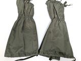 pair of army green gloves on a white background