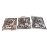 three bags of coffee sitting on top of each other
