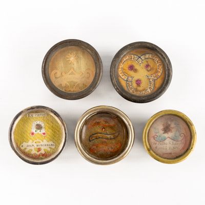 six different types of tinned containers are shown on a white surface