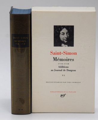 two books sitting next to each other on a white surface