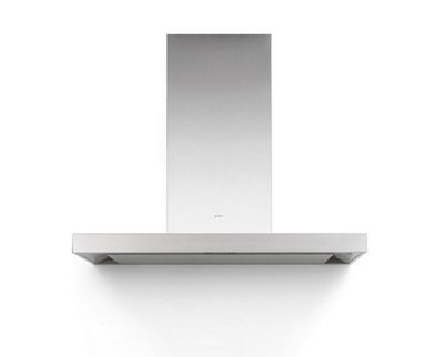 un gros plan d'une hotte de cuisine blanche fixée au mur