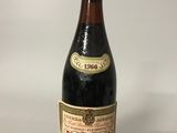 an image of a bottle of wine sitting on top of a table