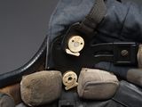 a pair of gloves and a pair of pliers on a glove