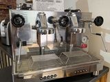 a coffee machine sitting on a counter in a kitchen