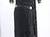 an image of a black lace dress on a mannequin mannequin