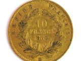 an image of a gold coin on a white surface