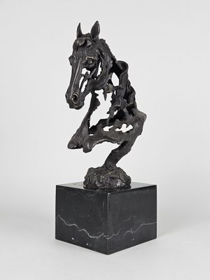 statue of a horse on a marble base on a white background