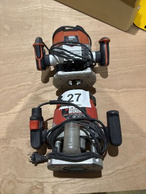 a picture of a corded sander sitting on a table